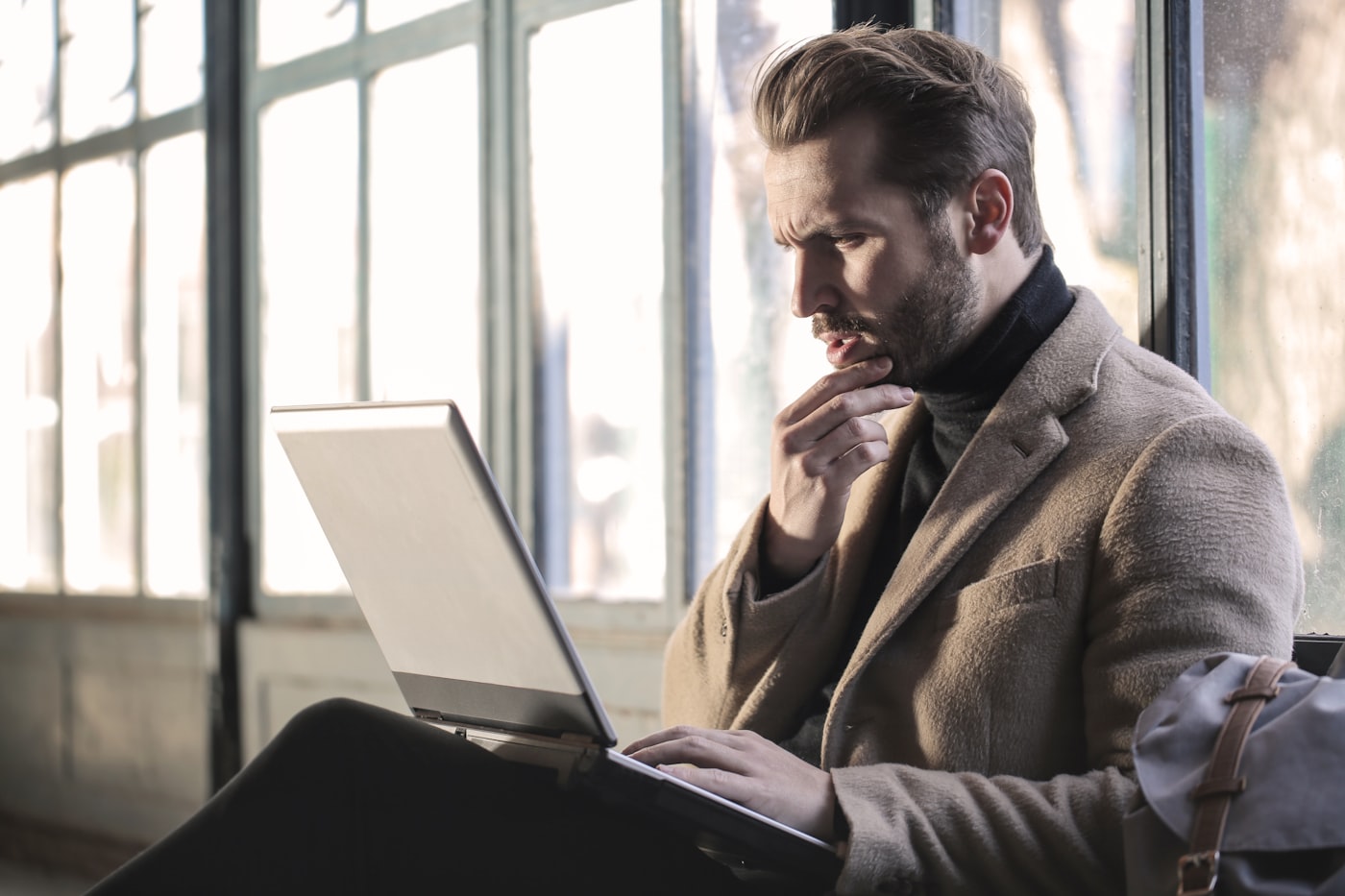 Business owner reviewing their website's free Buzzing Bee audit report