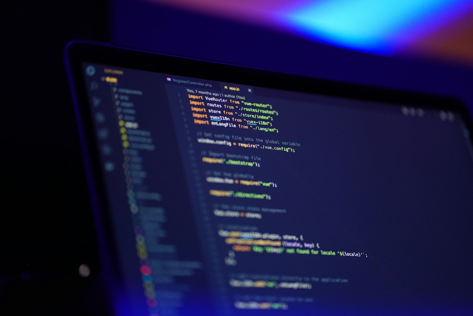 A close-up of code on a laptop screen representing software development