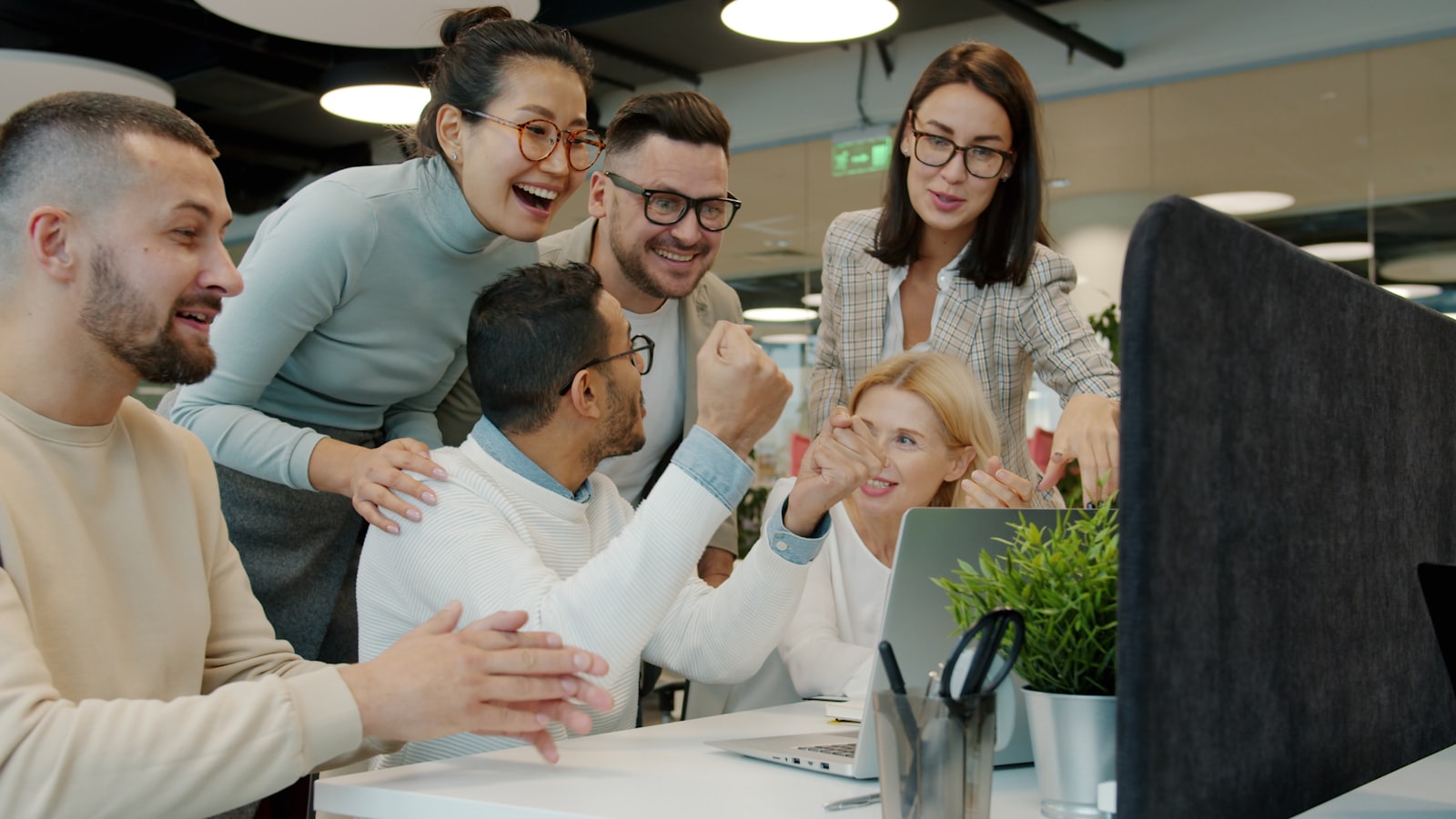 Marketing team reviewing a social media campaign's engagement results